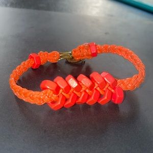 Neon orange knit bracelet